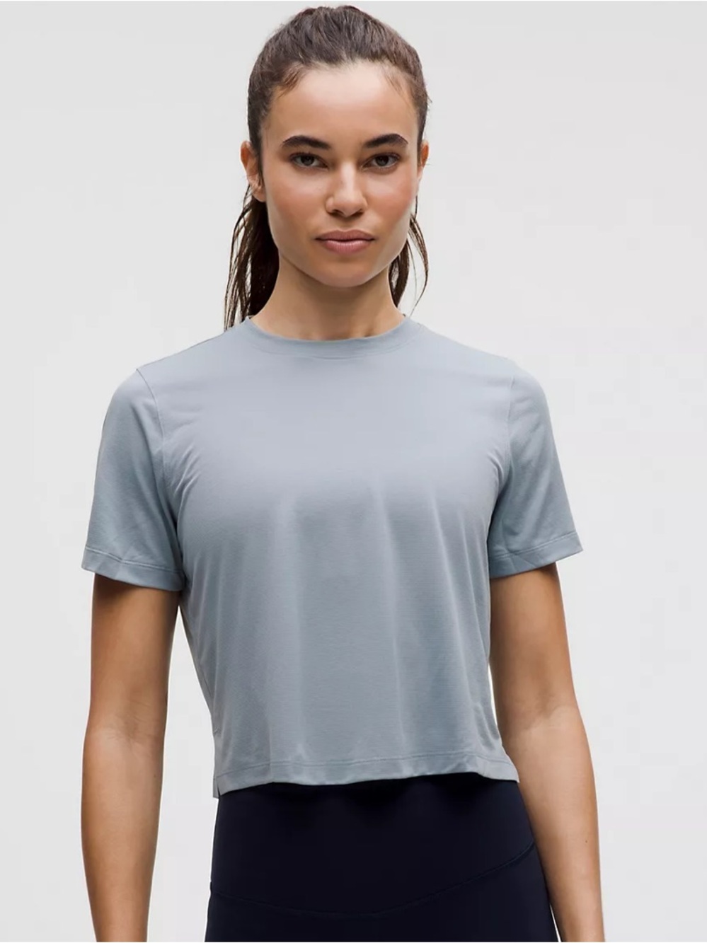 Lululemon Ultralight Waist Length Tee Women’s 6 Concrete Blue